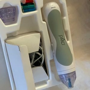 PMD microderm facial device